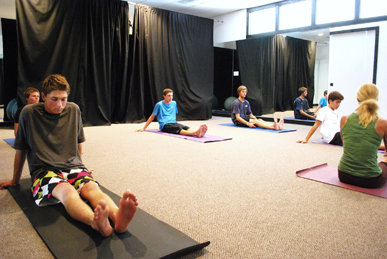 Surfers Doing Yoga at Fulcrum fulcrum surf camp